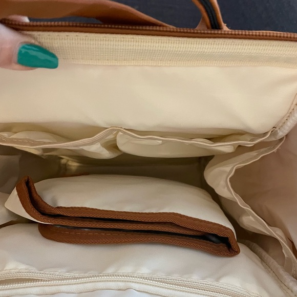 Diaper bag never used. Has soft leatherlook.( man made material) - Picture 5 of 8